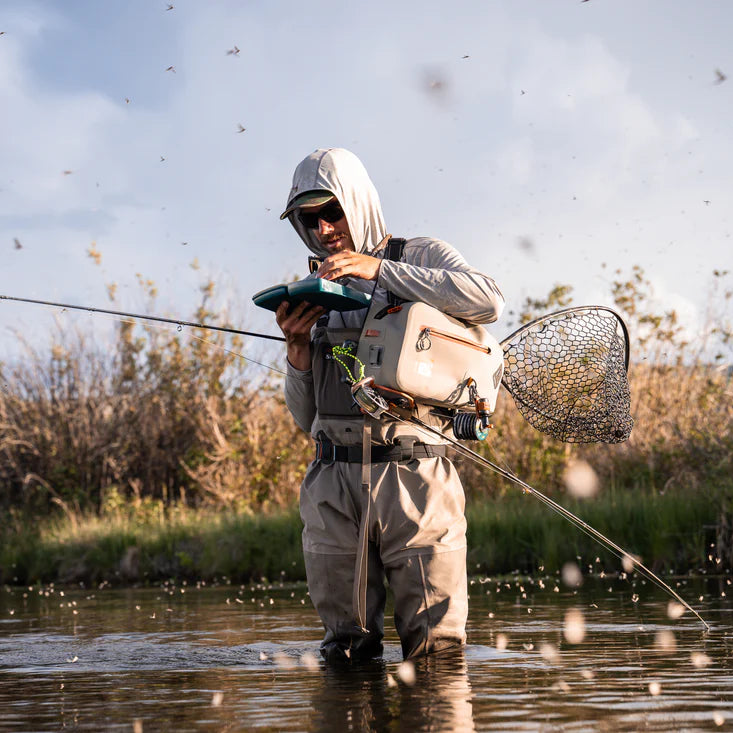 Angler selecting the perfect fly