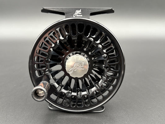 Abel TR Fly Reels in Black with classic click-pawl design - side