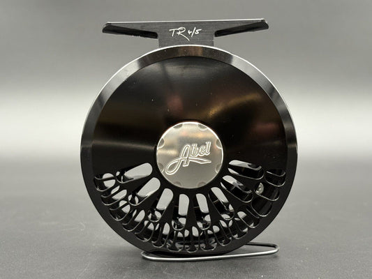 Abel TR fly reel in Black finish with ported spool and palming rim